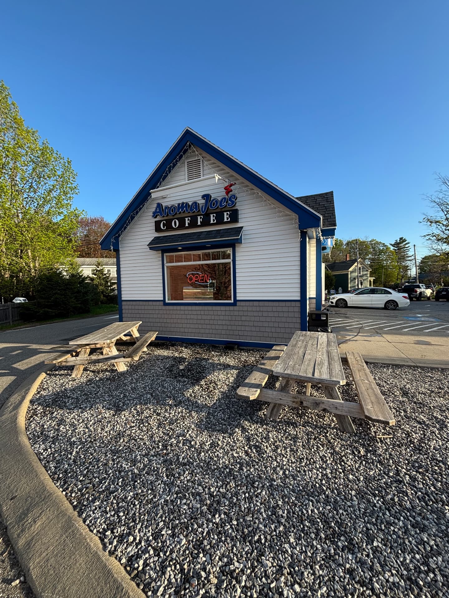 Aroma Joe's coffee shop storefront with spotless glass in Maine